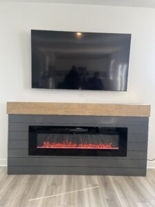 Transform your home with custom electric fireplace buildouts. Discover how Radford Woodworks can create a stunning focal point that adds warmth and style.