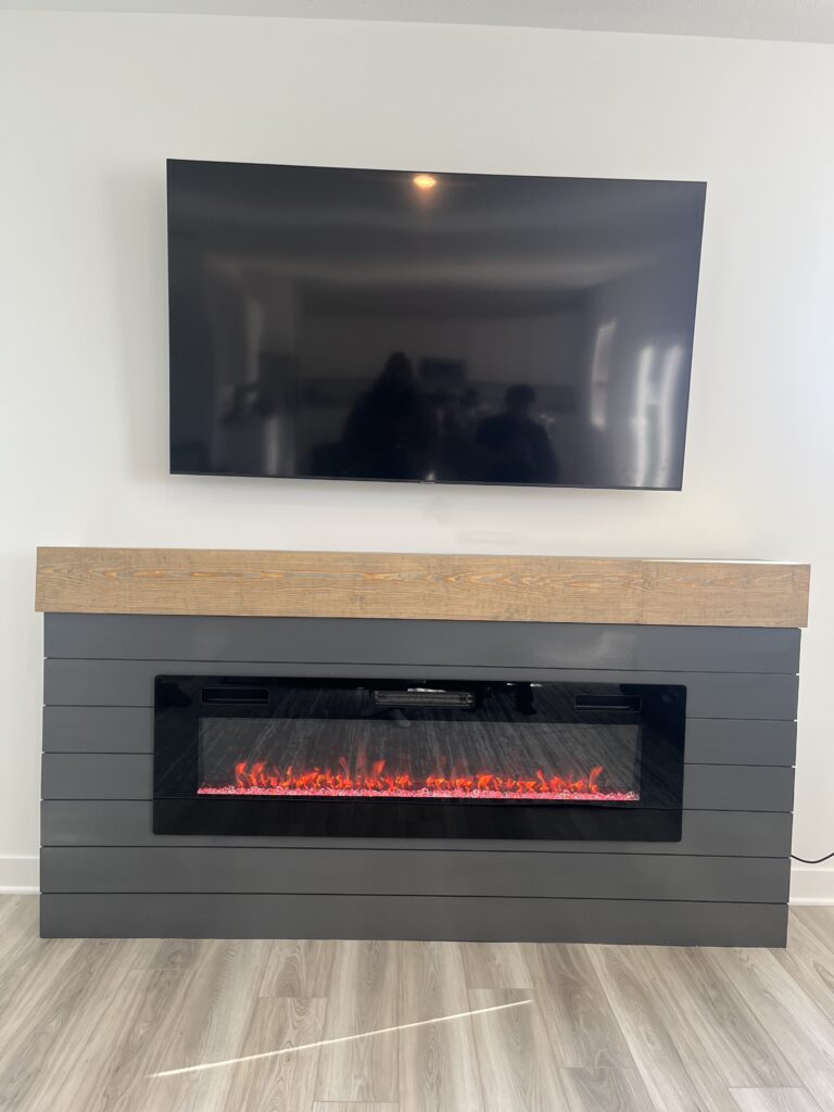 Transform your home with custom electric fireplace buildouts. Discover how Radford Woodworks can create a stunning focal point that adds warmth and style.