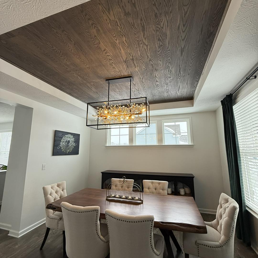 A tongue-and-groove ceiling built from custom-milled Indiana red oak — installed tight, stained to match the home's interior, and finished at the highest level. See what true custom woodwork looks like.