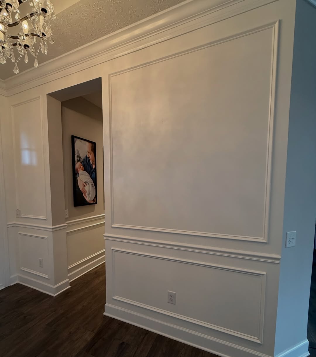 An entryway transformed with a black shiplap ceiling, custom picture frame molding, and wainscoting carried through the hallway at the right height. See how Radford Woodworks turned a Carmel, Indiana home into something truly unforgettable.