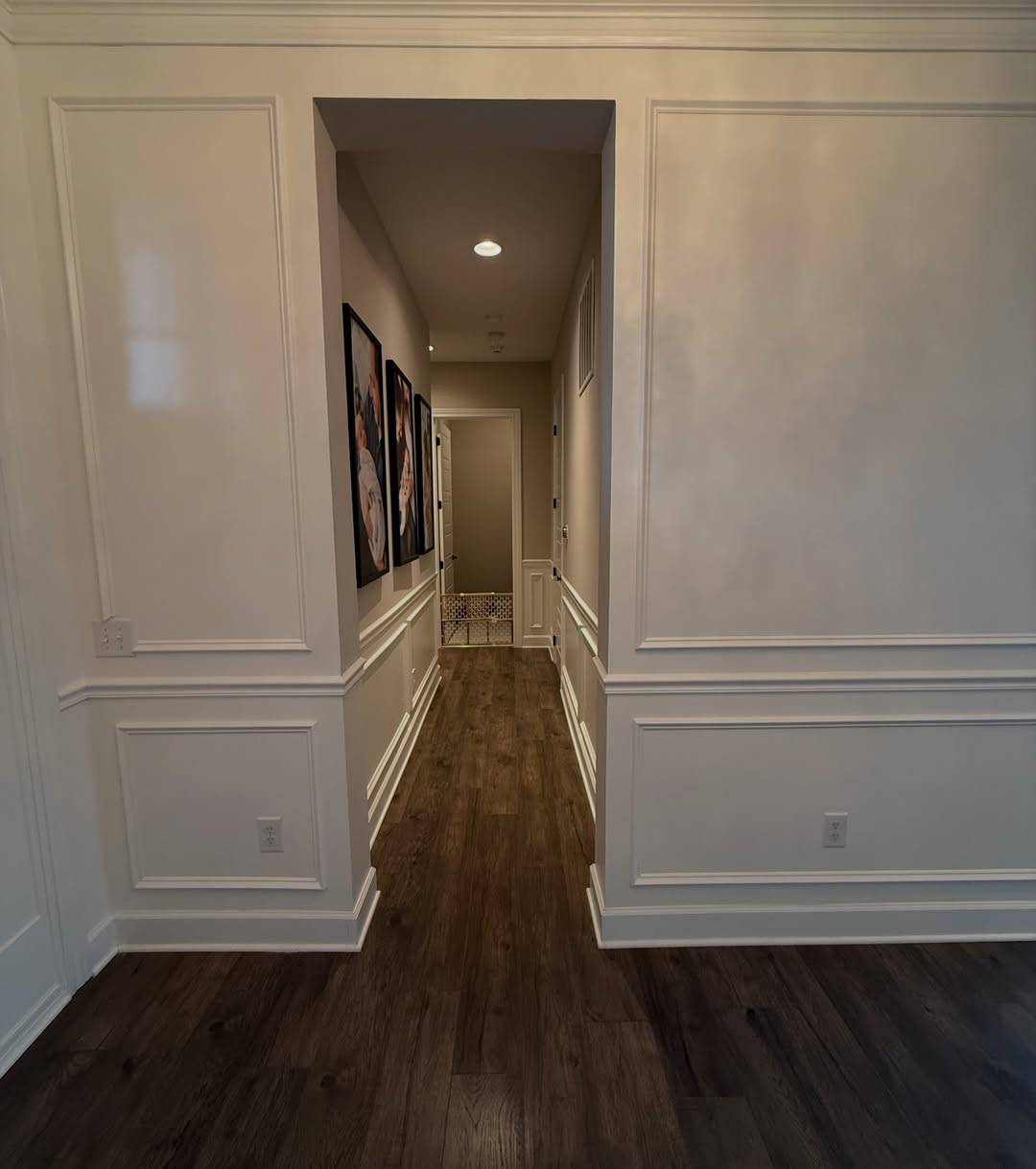 An entryway transformed with a black shiplap ceiling, custom picture frame molding, and wainscoting carried through the hallway at the right height. See how Radford Woodworks turned a Carmel, Indiana home into something truly unforgettable.