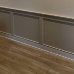 Accent wall design can turn a long blank walkway into one of the strongest features in a home with clean trim carpentry, balanced layout, professional painting, and custom finish work.