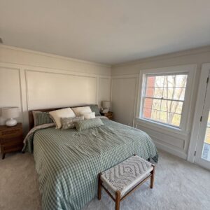Molding brings quiet character to a primary suite through picture frame detail, beadboard, cove molding, trim carpentry, accent walls, and custom finish work.