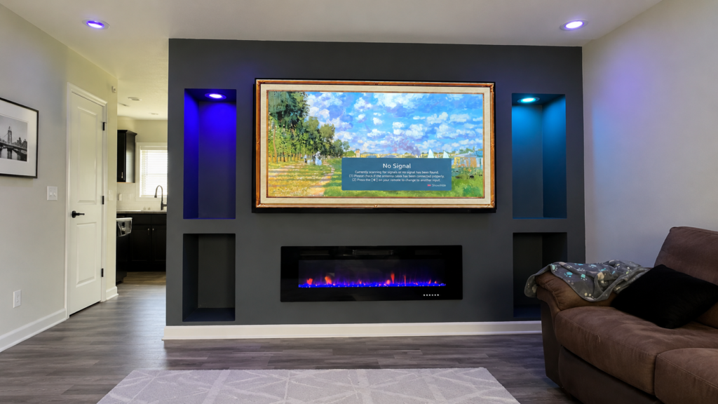 Indiana electric fireplaces trend: charcoal media wall with a frame-style TV, lighted recessed niches, and a linear fireplace with a blue ember bed