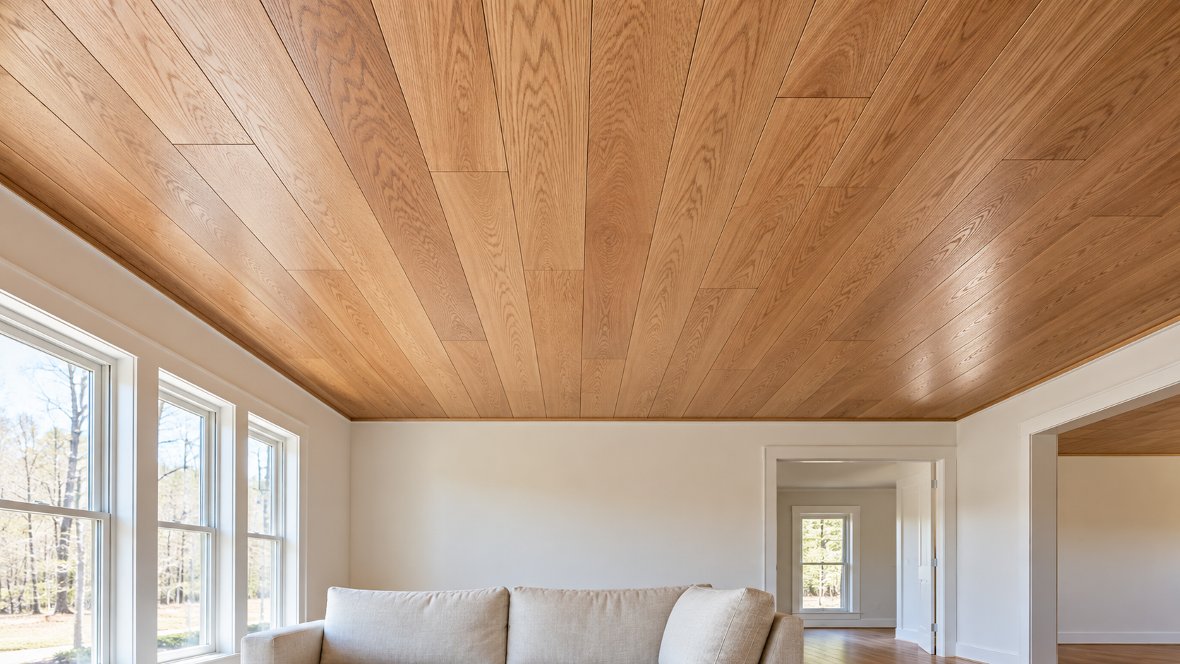 Indiana oak trim shown as a wide red oak plank ceiling above a bright living room